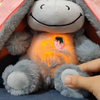LumiDonk™ - Atmender Plüsch Esel Baby